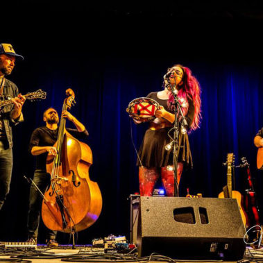 Som Yadkinville performs on stage