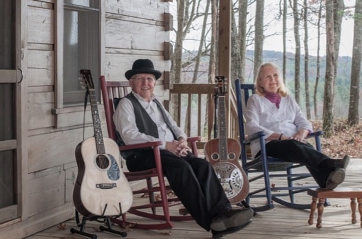 Bill and Maggie Anderson sitting in rocking chairs