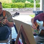 Scott Freeman and Willard Gayheart playing mandolin and guitar