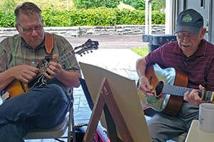 Scott Freeman and Willard Gayheart playing mandolin and guitar