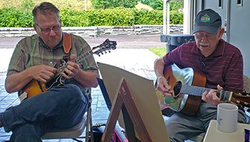 Scott Freeman and Willard Gayheart playing mandolin and guitar