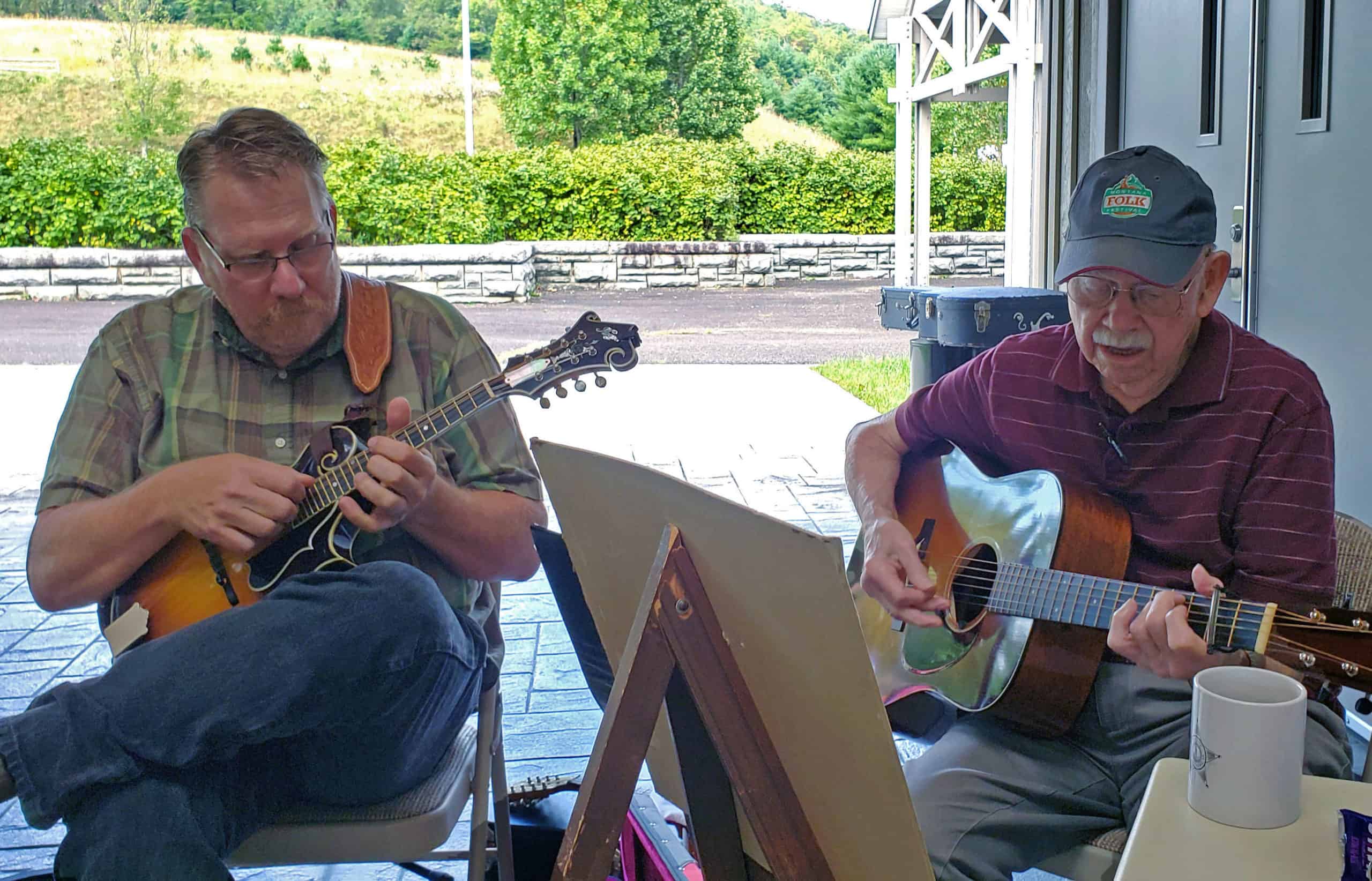 Scott Freeman and Willard Gayheart playing mandolin and guitar