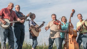 Mountain Breeze Band playing instruments outside