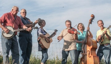 Mountain Breeze Band playing instruments outside